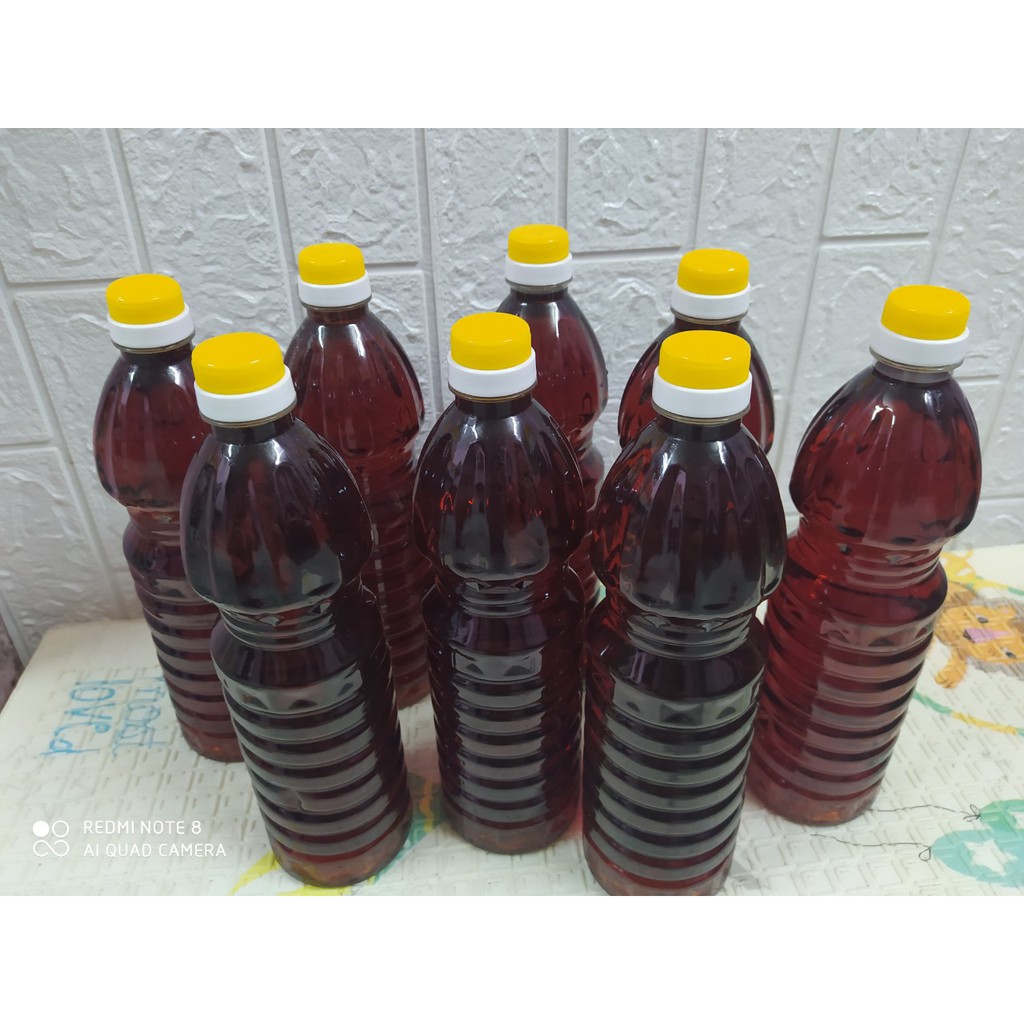 Nước mắm truyền thống loại ngon 1L dộ đạm 35-40% thành phần là cá cơm và muối biển | BigBuy360 - bigbuy360.vn