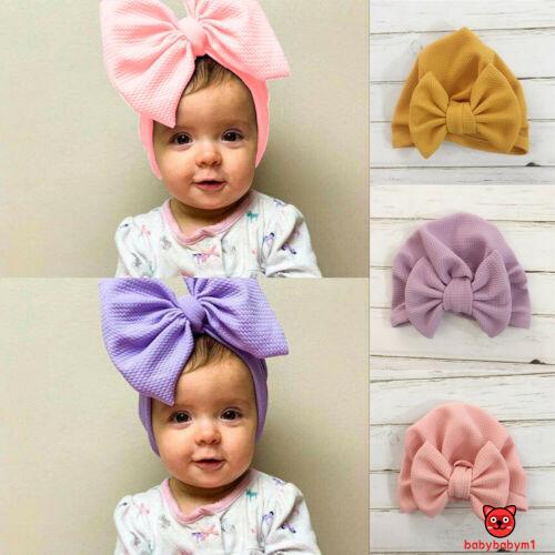 Mũ beanie đính nơ màu sắc kẹo ngọt cho bé