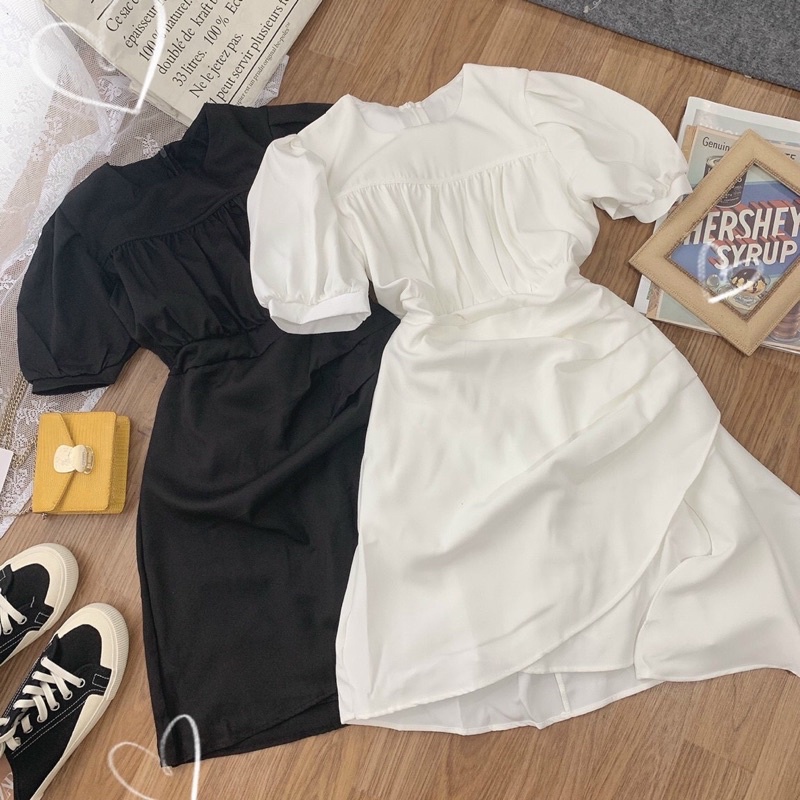 Đầm đen tay phồng vạt chéo