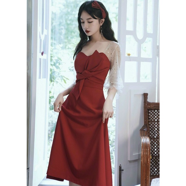 Đầm xoè tay phối lưới nơ ngực màu đỏ