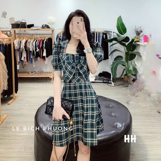 Váy xoè xanh nơ ngực