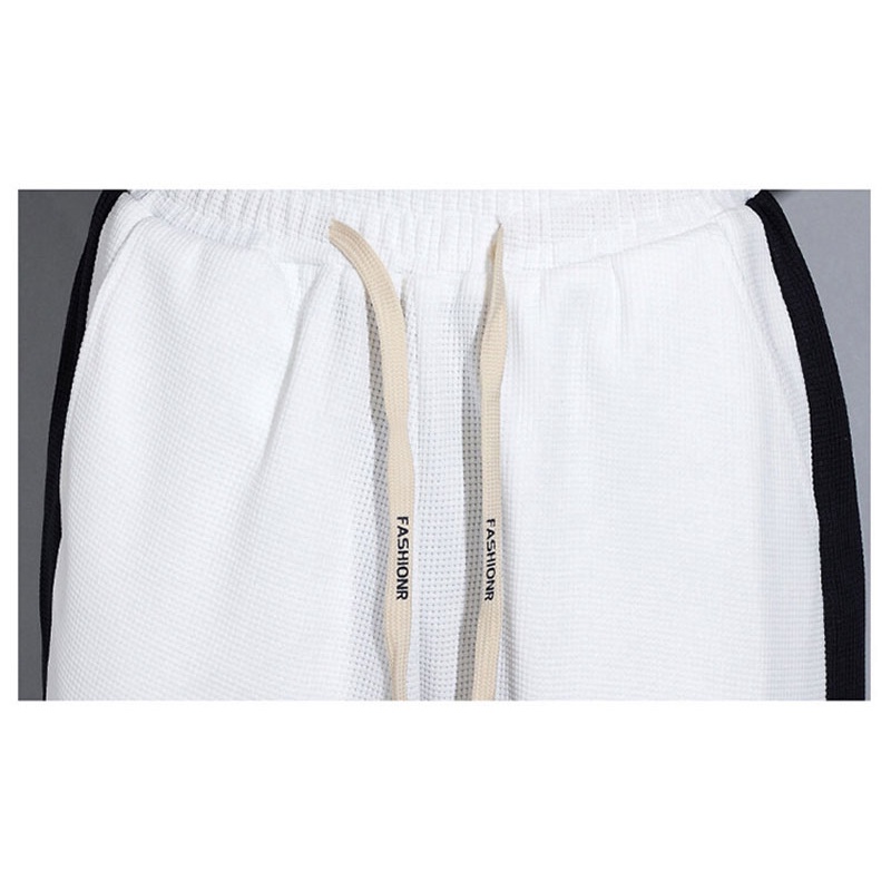 Quần Dài Thể Thao Dáng Rộng Có Túi Sau Lưng Thời Trang Mùa Thu Cho Nam