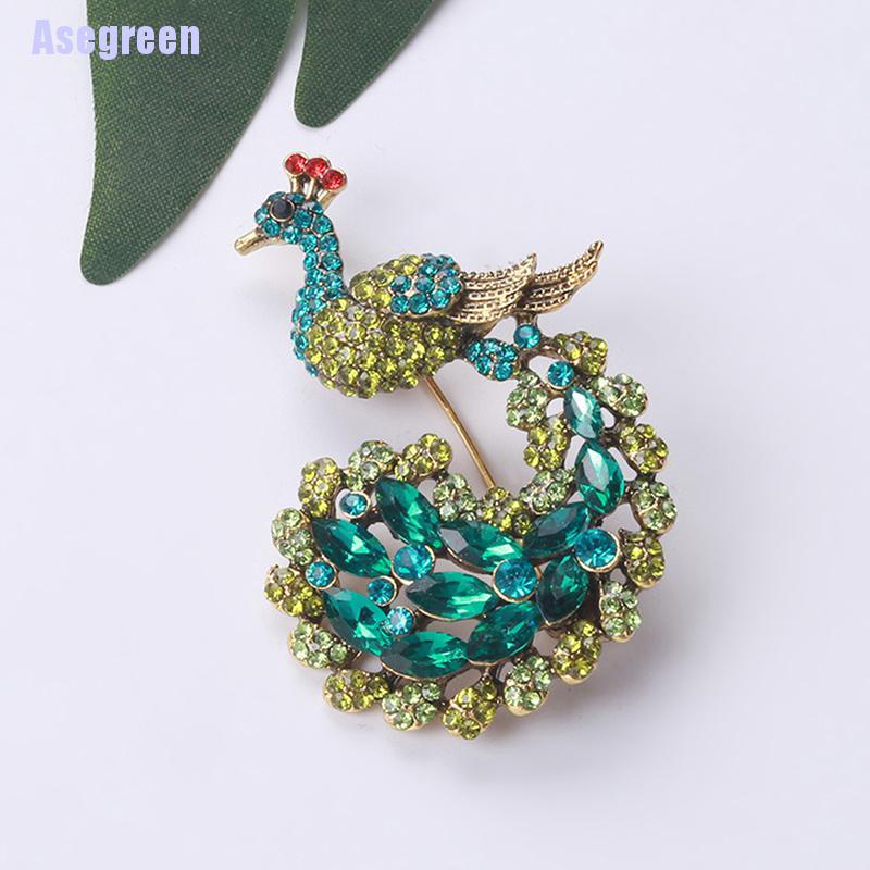 Ghim cài áo hình chim công đính đá xanh lá thời trang