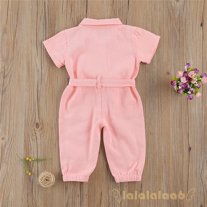 Jumpsuit màu hồng có thắt nơ năng động cho bé