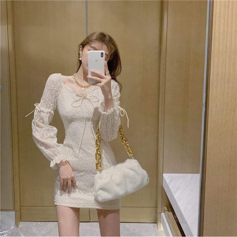 đầm trễ vai cột nơ