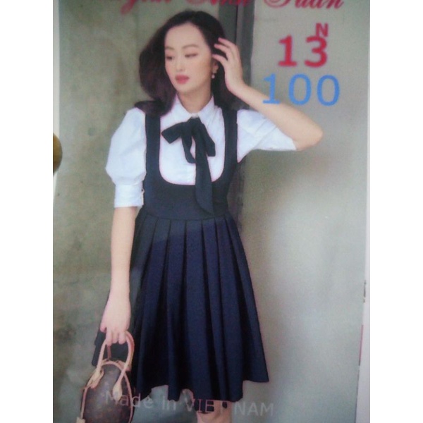 Đầm nơ tay bồng
