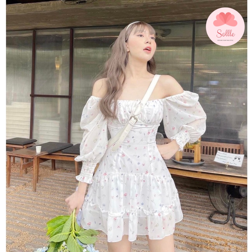Đầm hoa nhí thắt nơ ngực dáng xòe Váy hoa dài tay bo chun lưng nhiều tầng Sollle