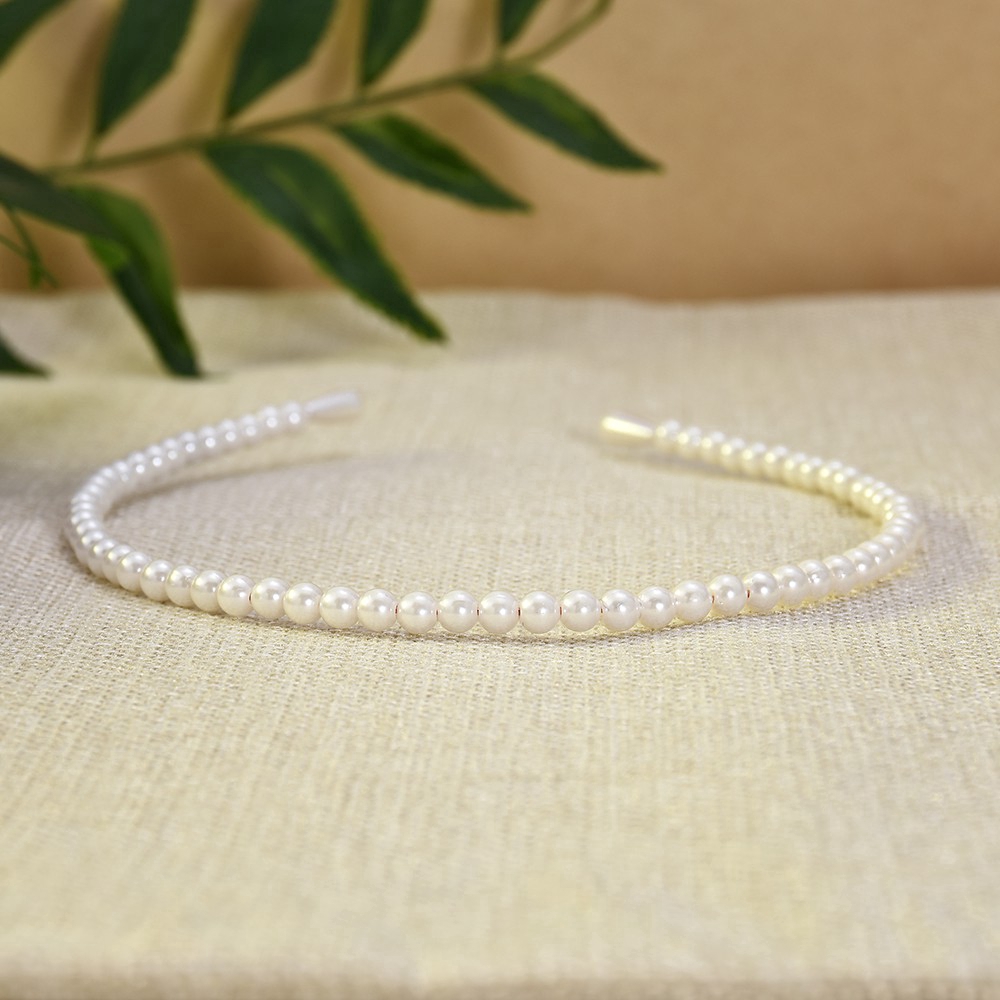 Băng đô đính ngọc trai giả thanh lịch