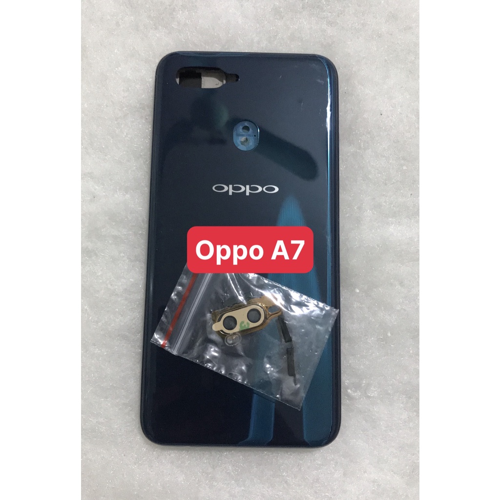 Bộ vỏ sườn oppo A7 zin  - bộ gồm lưng, sườn và phím bấm. kính camera