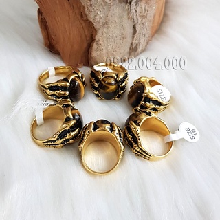Nhẫn nam móng vuốt gắn đá mắt hổ.