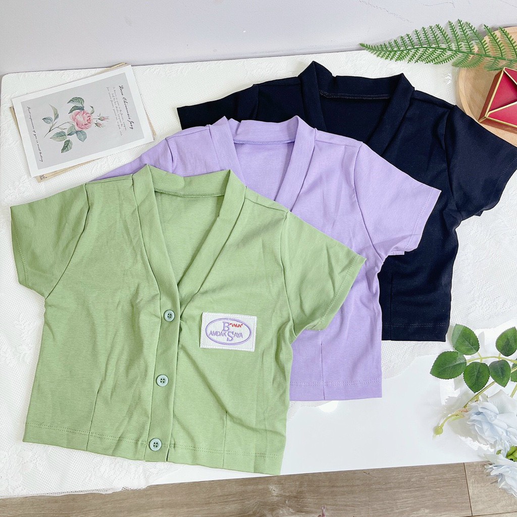 áo croptop cô tim cài nút thêu logo xinh