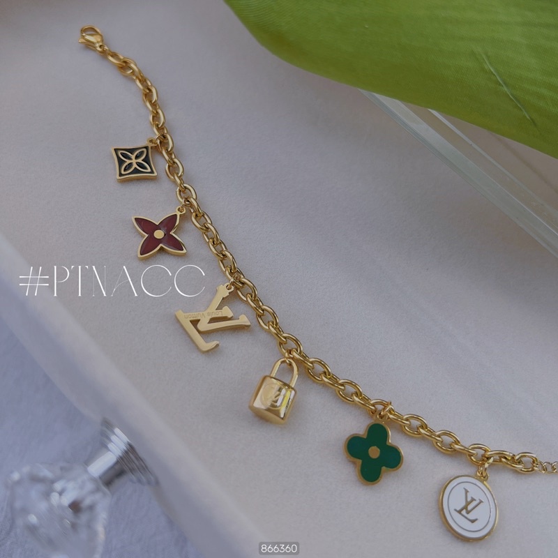 Lắc tay titan charm tòn ten logo thương hiệu cỏ 4 lá nhiều màu dễ thương .PTNACC.