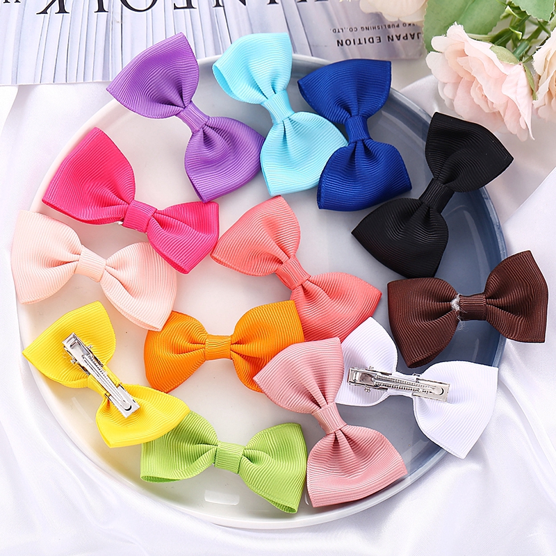 Kẹp tóc đính nơ mini dễ thương dành cho bé gái