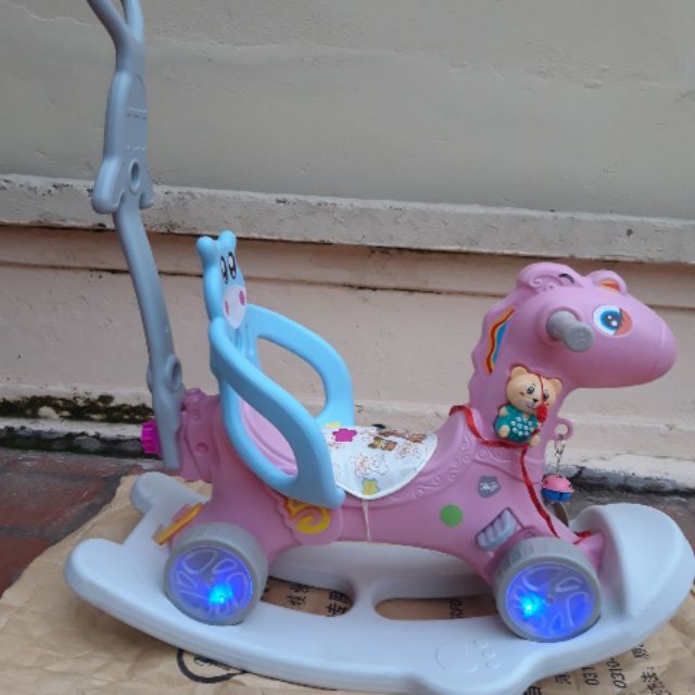 Ngựa bập bênh chòi chân 5 in 1 cho bé có bánh xe, tay đẩy ,có nhạc cho bé, có đèn LED bánh phát sáng