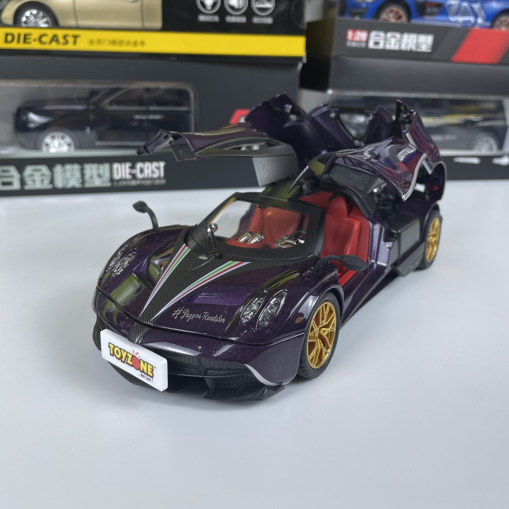 Mô hình siêu xe THẦN GIÓ Pagani Huayra Roadster tỷ lệ 1:24 mở full cửa có đèn, âm thanh, vô lăng đánh lái bấm còi