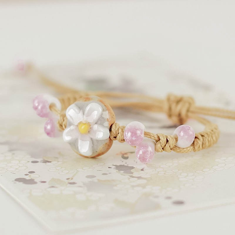 VÒNG TAY GỐM HOA HỒNG