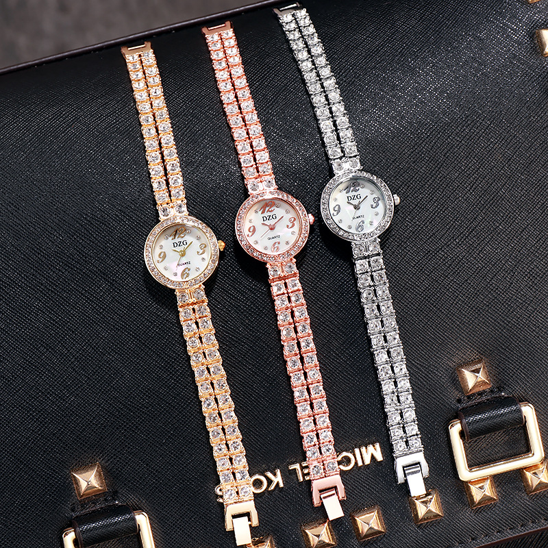 Đồng Hồ Máy Quartz Đính Hột Xoàn Lung Linh Với Dây Thép Không Gỉ Sang Trọng Cho Nữ