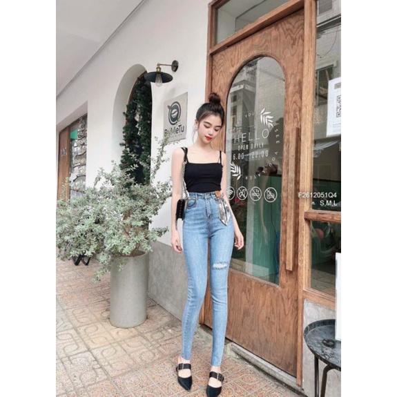 Quần jean ôm rách phối nơ vải lưng cao