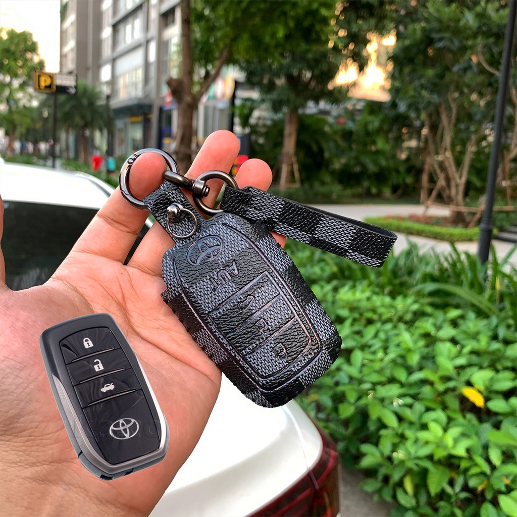 Đựng smartkey Toyota Fortuner Land Cruiser Camry 3 nút bấm khâu tay TFO3V AD có tay cầm