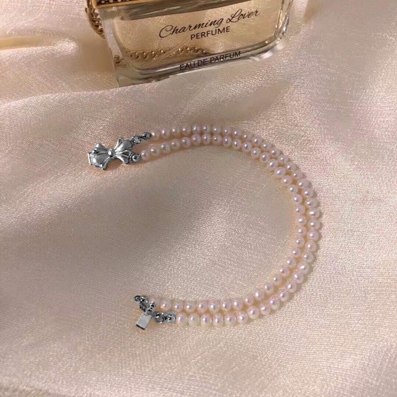 Vòng tay hạt ngọc trai nhân tạo đôi 5ly nơ bạc