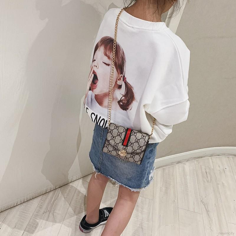 Túi đeo chéo mini bằng da PU họa tiết hoa dành cho bé gái