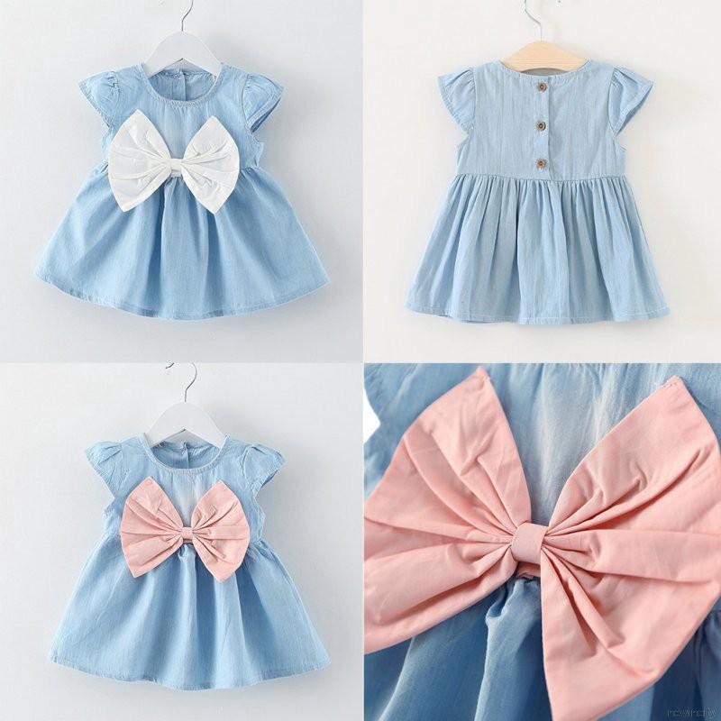 Đầm ngắn phối nơ lớn xinh xắn cho bé gái