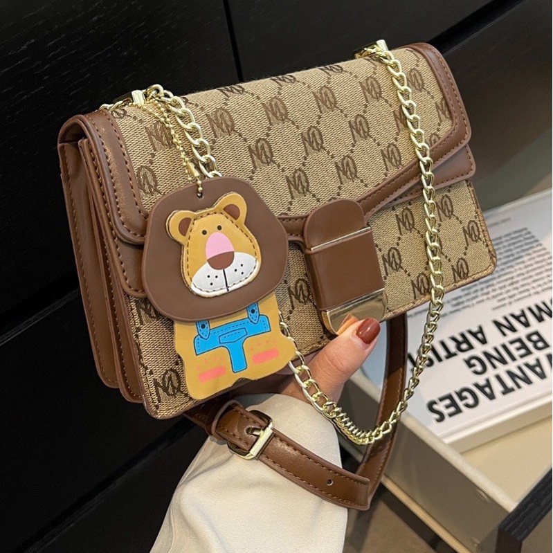 Túi MQ KÈM CHARM SƯ TỬ
