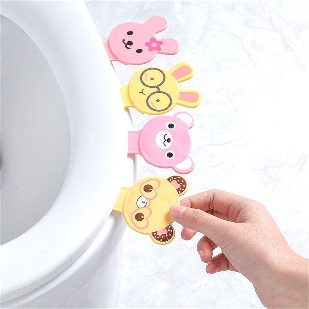 Dụng Cụ Nhấc Nắp Bồn Cầu Họa Tiết Hoạt Hình Tránh Chạm Tiện Dụng