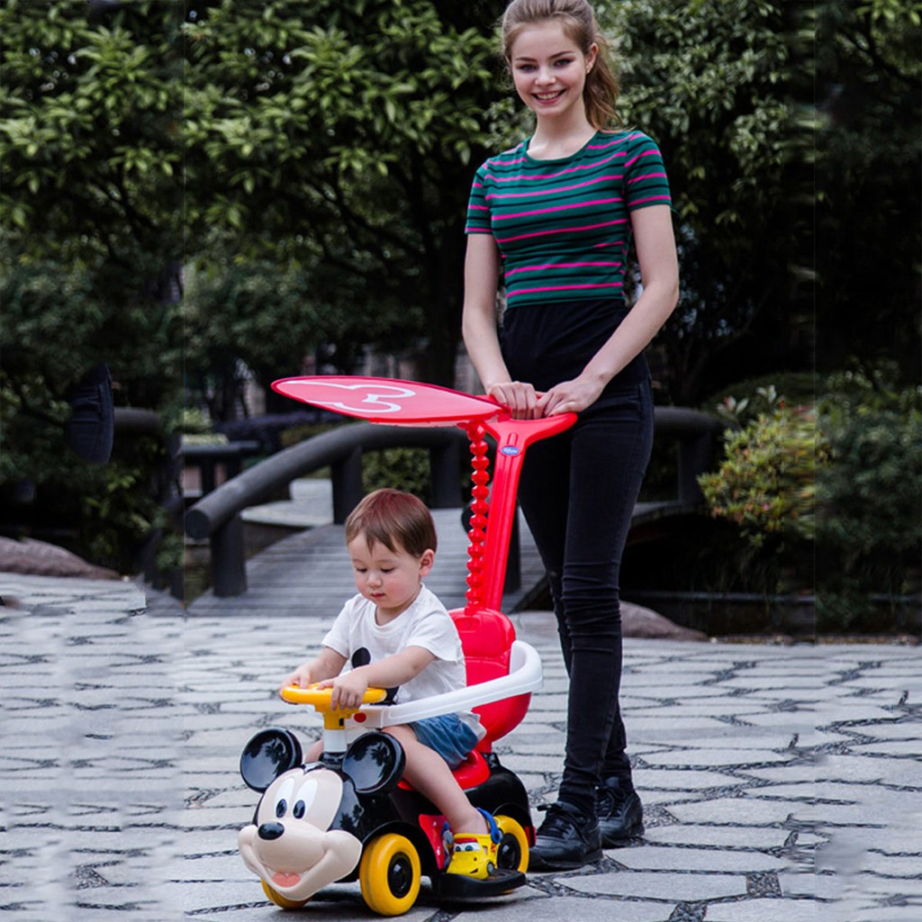 Disney Children Twist Car Bốn bánh Xe đẩy trẻ em 1-3 tuổi Xe đẩy Niuniu Musical Walker
