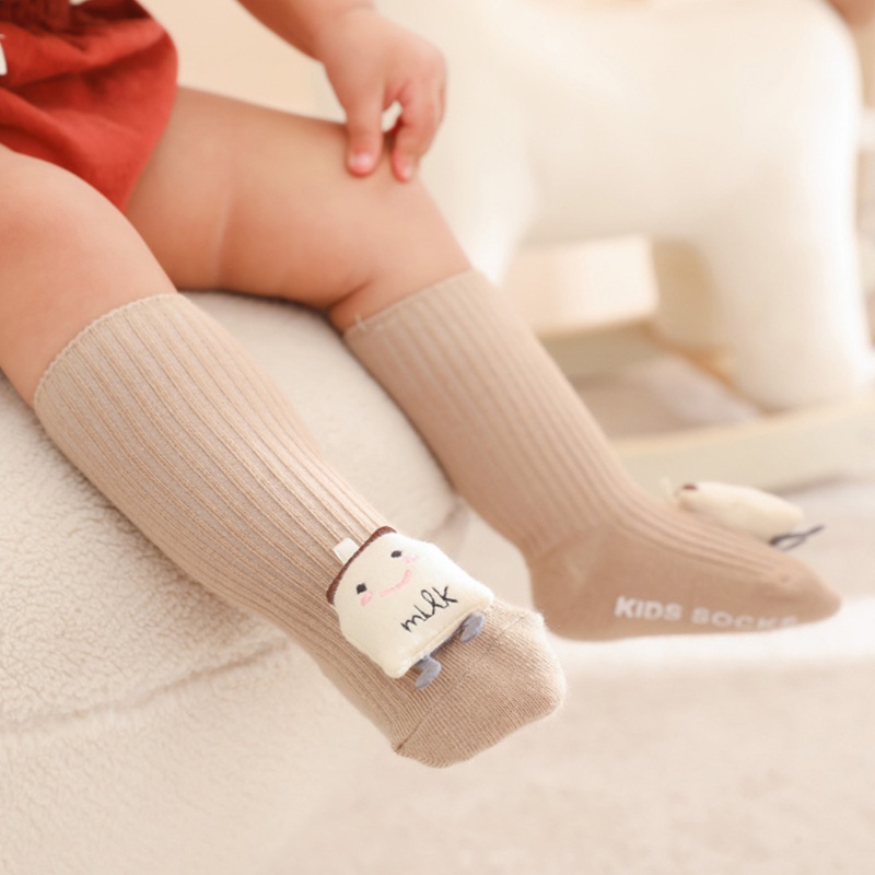 Đôi vớ cotton dài đến đầu gối màu trơn thoáng khí chống trượt họa tiết hoạt hình cho bé sơ sinh tập đi an toàn