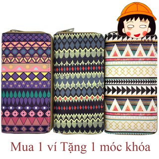 Bóp ví dài cầm tay nữ họa tiết hình học độc đáo da trơn !