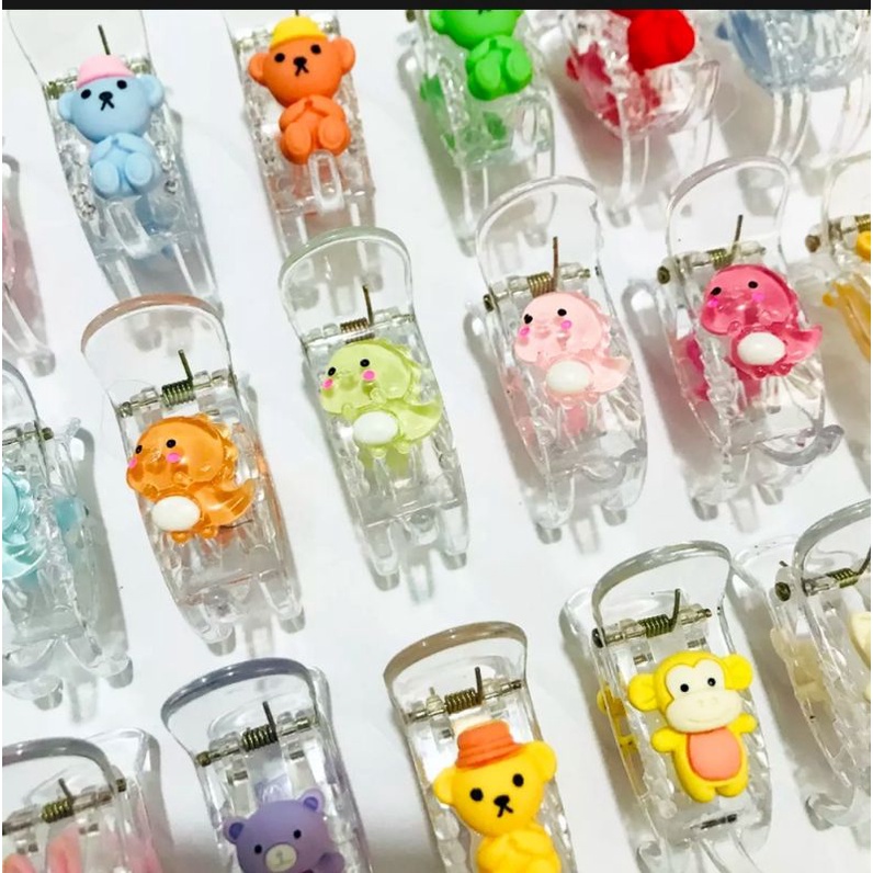 Sỉ lố 12 kẹp càng cua gắn icon hoạt hình mix