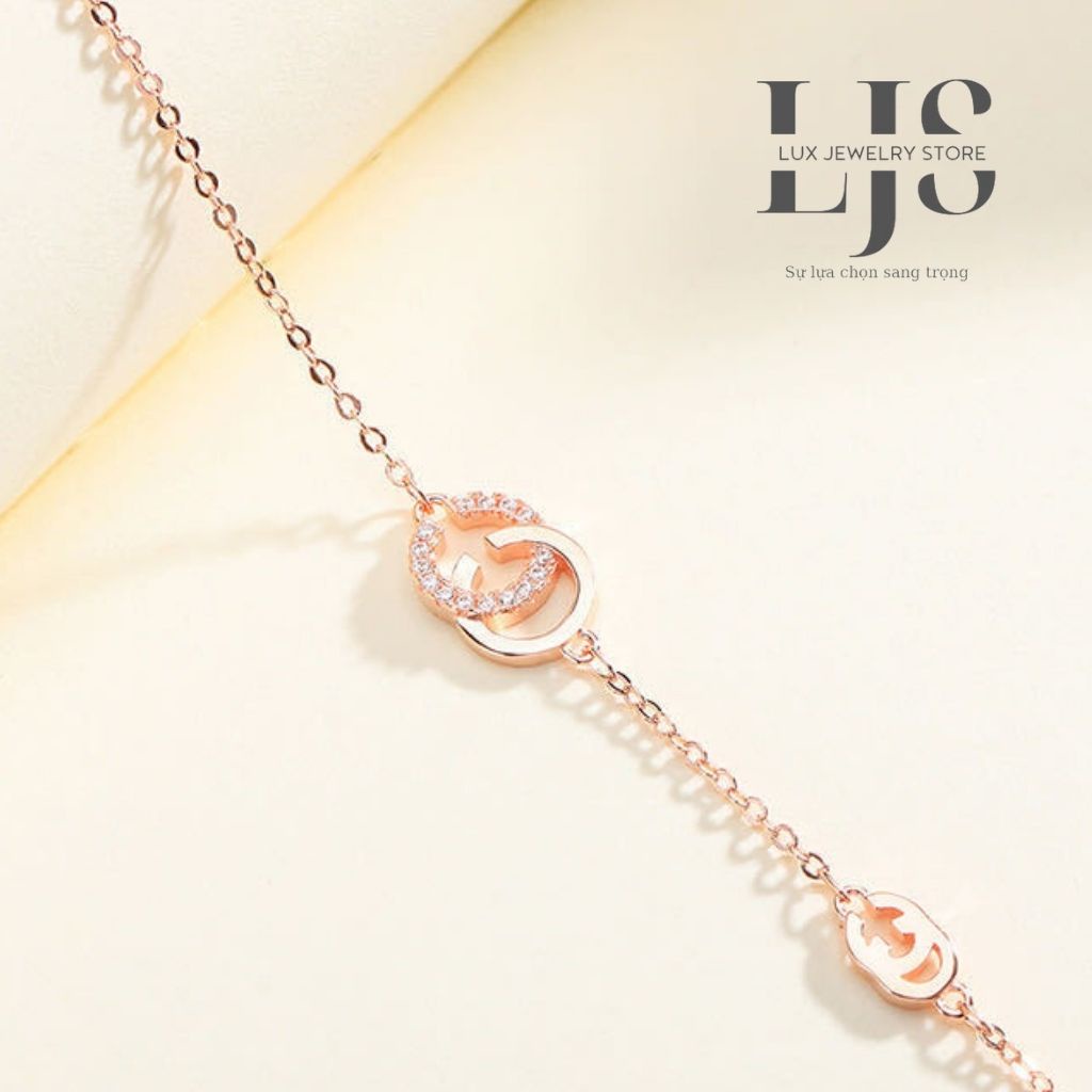 Vòng tay bạc mạ vàng 14k Lux Jewelry, lắc tay mặt chữ CC đính đá – LUXJ910