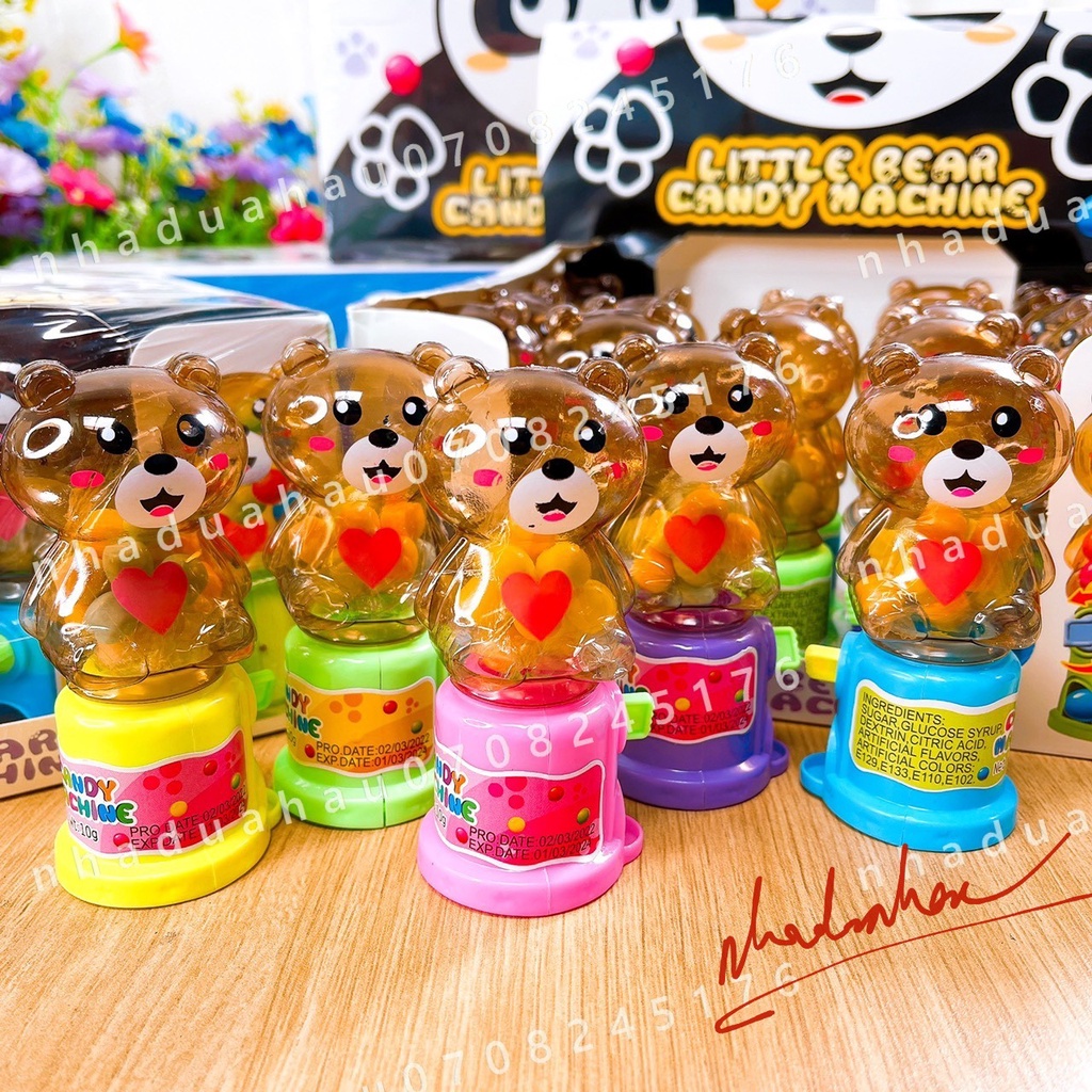 Một lốc gồm 20 cái máy bắn kẹo đồ chơi (kèm kẹo) hình gấu dễ thương Hongkong cái 20gam