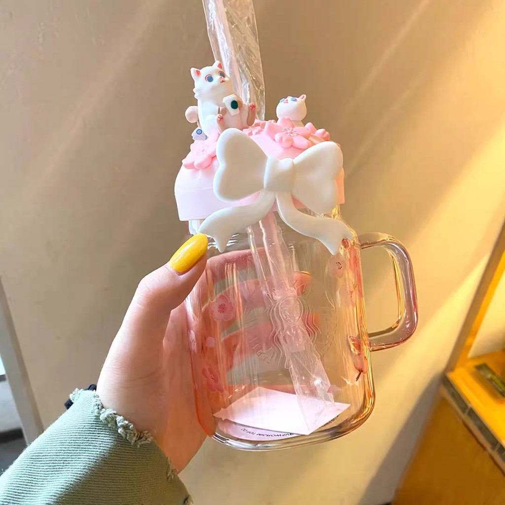 Ly thủy tinh STARBUCKS màu hồng Sakura có quai cầm và ống hút dung tích 400ml