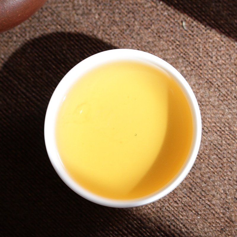 Bánh Trà Phổ Nhĩ Sống Mãnh Hải Vân Nam 357 gram (Trà Vụ Xuân Năm 2017)