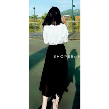 Chân váy TOUSHI đen dáng dài.