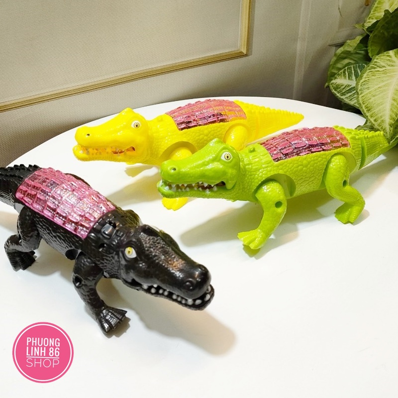 Đồ chơi cá sấu chạy pin có đèn nhạc shop phương linh 86 D8