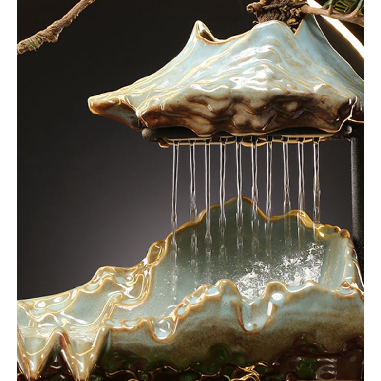 thác nước phong thủy kết hợp bể cả. bể cá tiểu cảnh phong thủy cao cấp