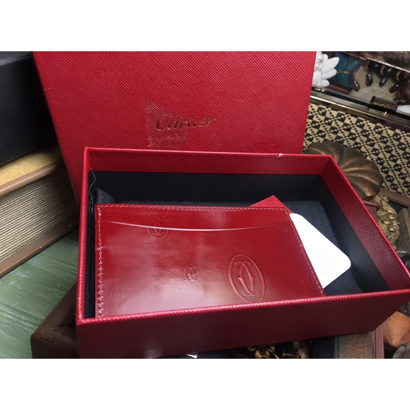 Ví để thẻ/ card da bóng màu đỏ Cart ier Pháp