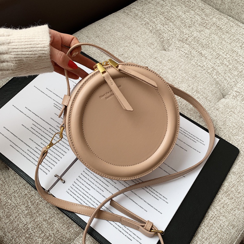 Korean niche design round cake simple retro handbag one shoulder under the bag women's apple small round bag