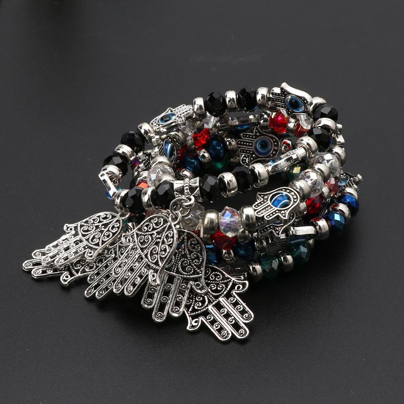 Vòng tay co giãn xanh phối chuỗi hạt hình mắt quỷ độc đáo