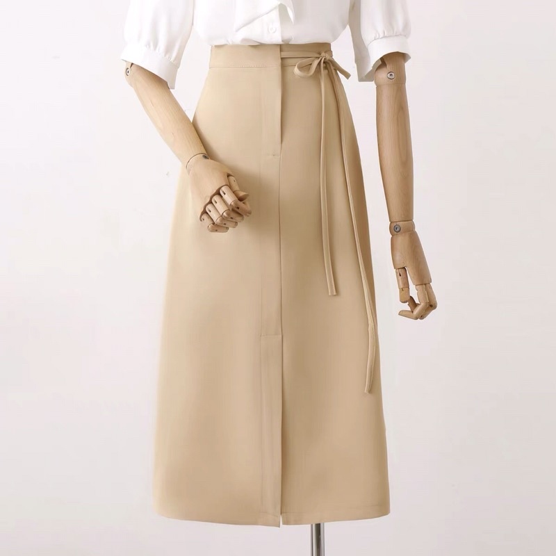 Chân váy chữ a công sở dáng dài xẻ trước thắt dây nơ nhỏ một bên, chân váy công sở chữ a dáng dài GUAN