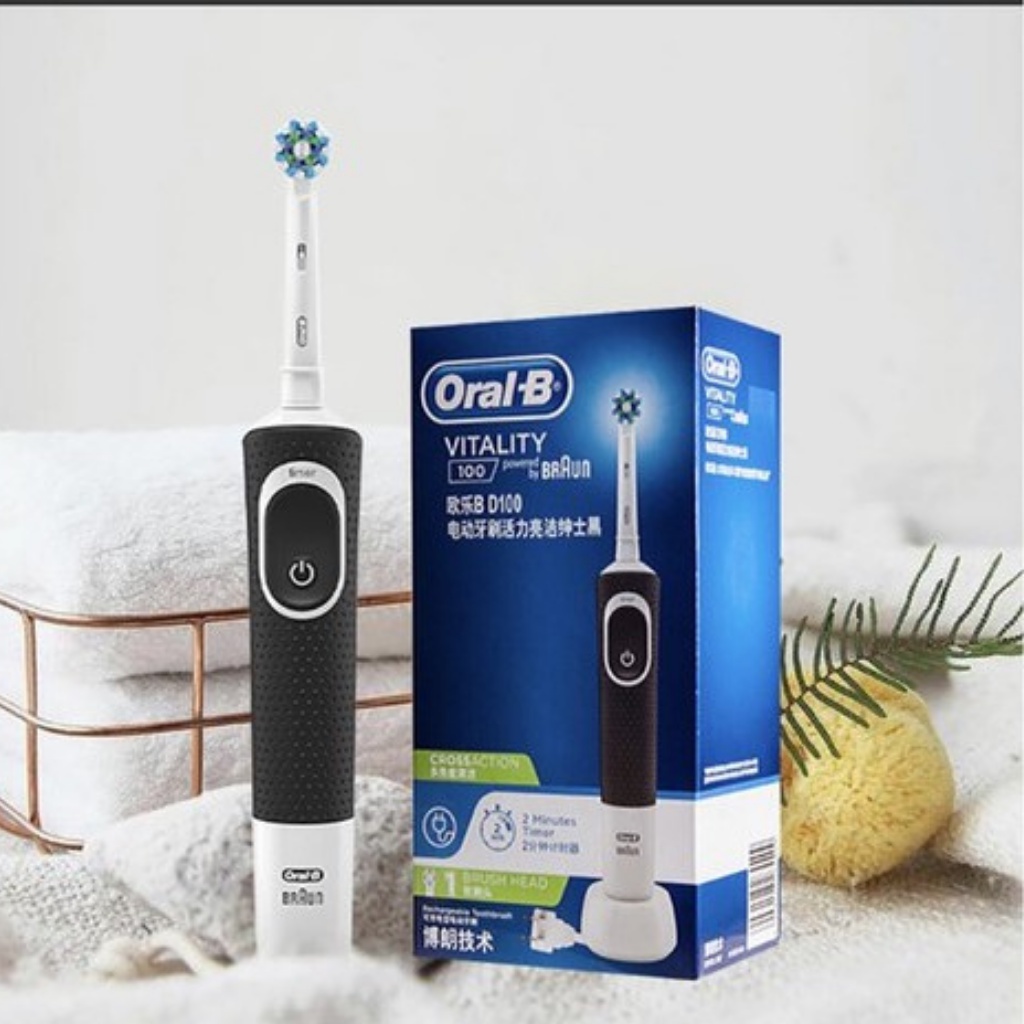 Bàn chải điện đánh răng tự động Oral B D100 trắng làm sạch răng, hạn chế viêm nướu kèm hộp nắp