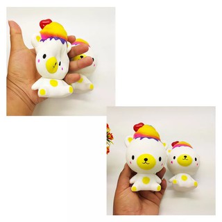 Squishy gấu vàng đội mũ đáng yêu