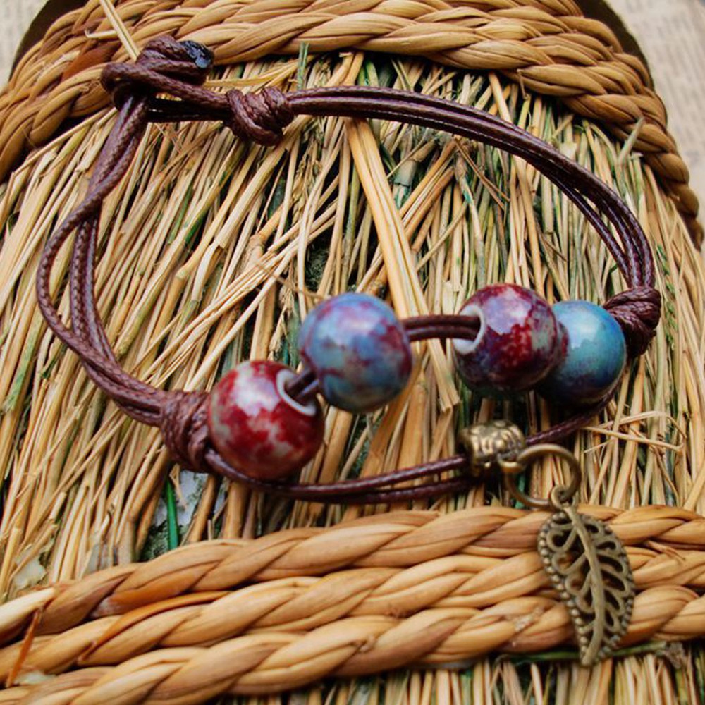 Vòng tay dây da 4 hạt sứ nhiều màu | BigBuy360 - bigbuy360.vn