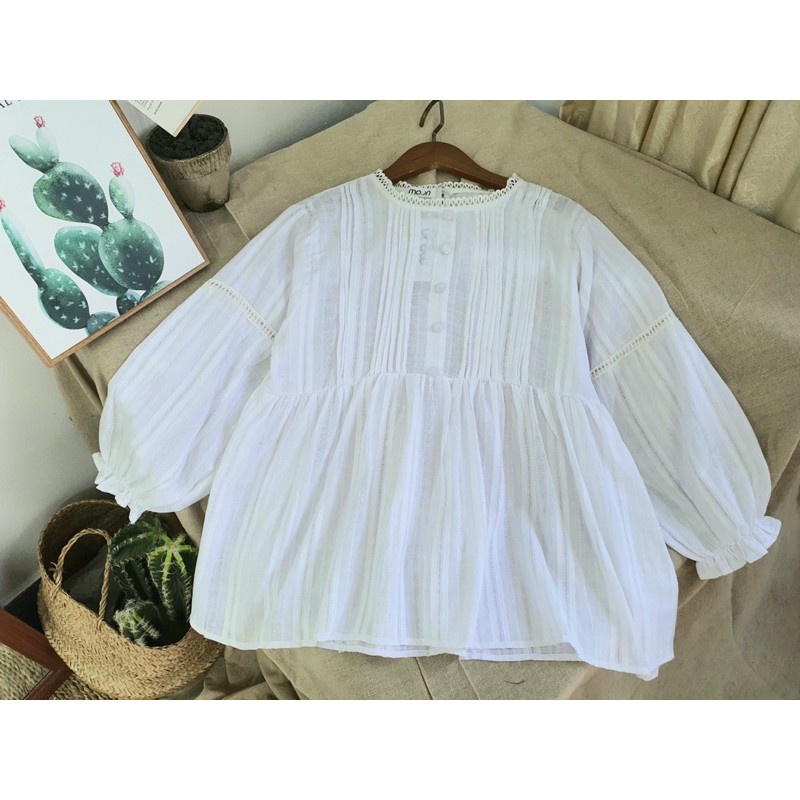 Áo baby doll trắng cúc bọc