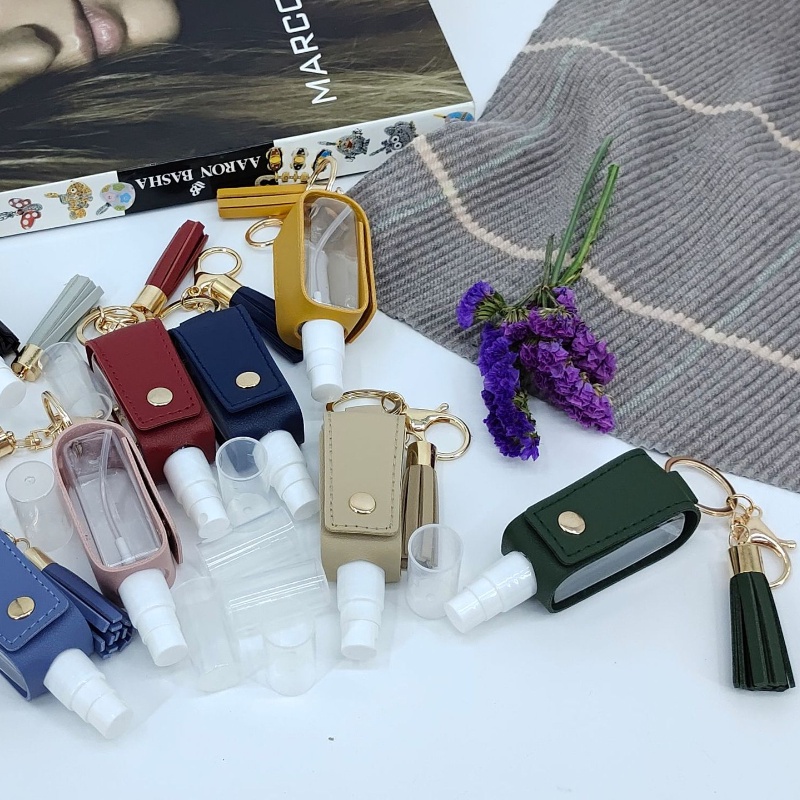 Bình xịt tinh dầu bình xịt mỹ phẩm đựng nước hoa phun sương Chai xịt cồn bọc da có móc khóa tiện dụng 30ml