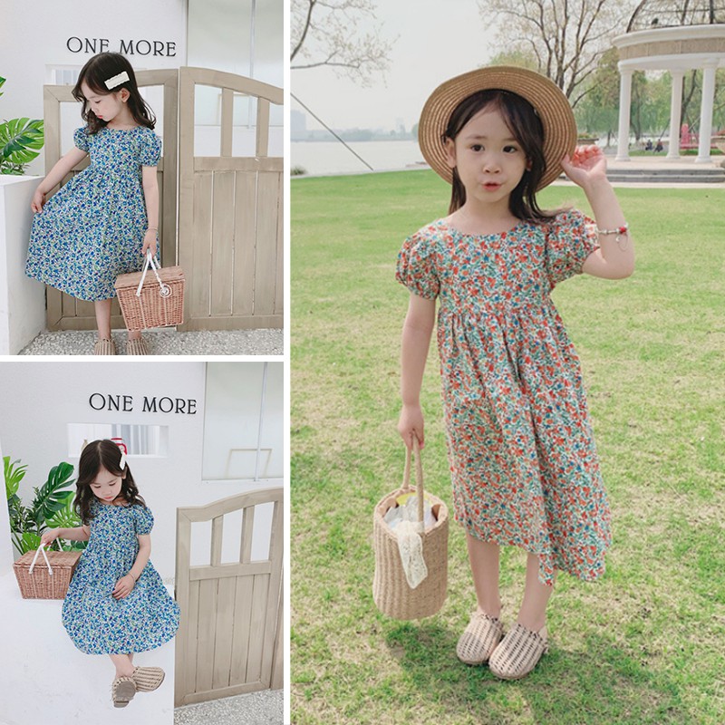 Đầm hoa thiết kế hở lưng xinh xắn cho bé gái