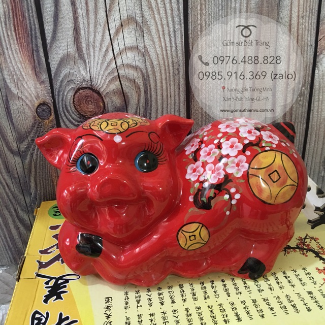 Heo tiết kiệm tài lộc dáng nằm vàng (màu đỏ)